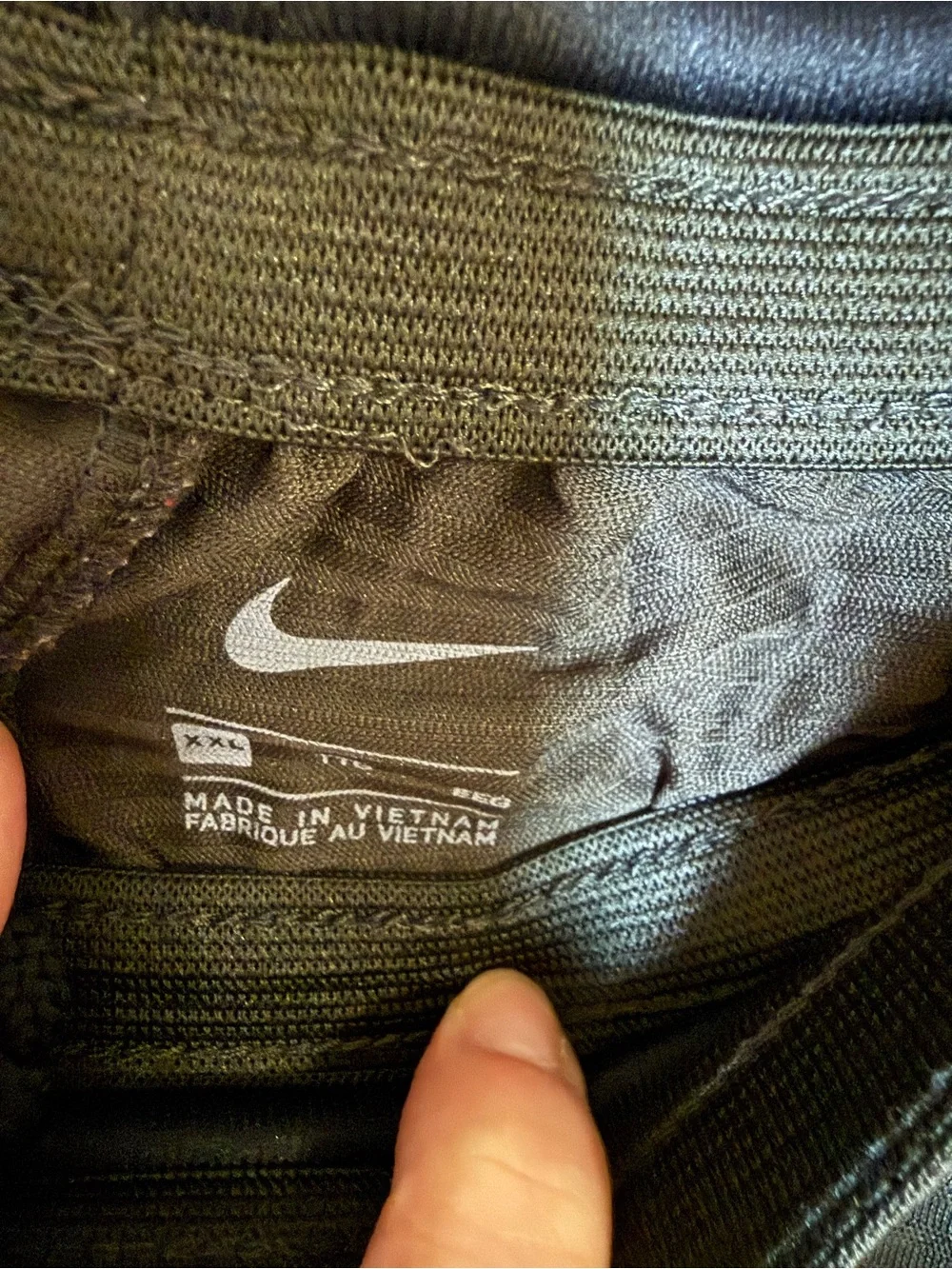 Nike Men's Olive Green Athletic Shorts with Black Panels and Red Swoosh